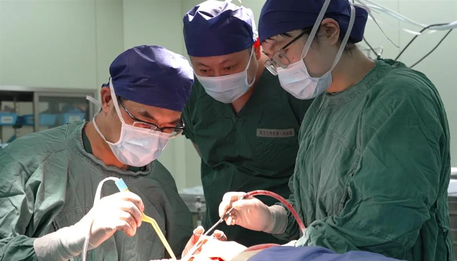 Hospital-supplied photograph of a pediatric neurosurgery team operating in a reported 2024 moyamoya case