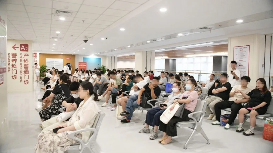 Obstetrics clinic waiting area documented by China National Radio