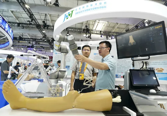 Hospital-developed orthopedic robot on display at an exhibition; this photograph was not taken in a treatment room
