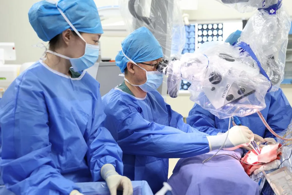 Xuanwu Hospital neurosurgeon performing an operation at the separate Xiong’an Xuanwu Hospital in 2024; hospital-supplied photograph